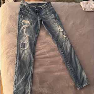Levi’s Denim Patchwork Jean’s Distressed EUC Size 26W 32L